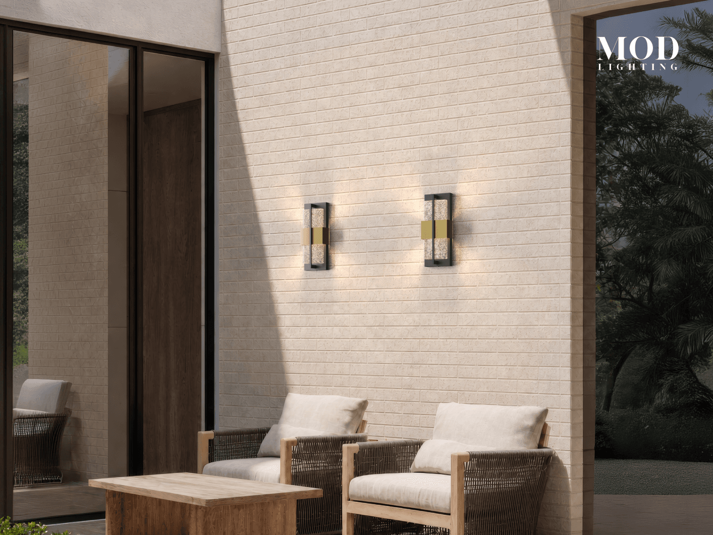 Mesa black and brass outdoor sconces, rectangular seeded-glass panels lit above a patio seating area